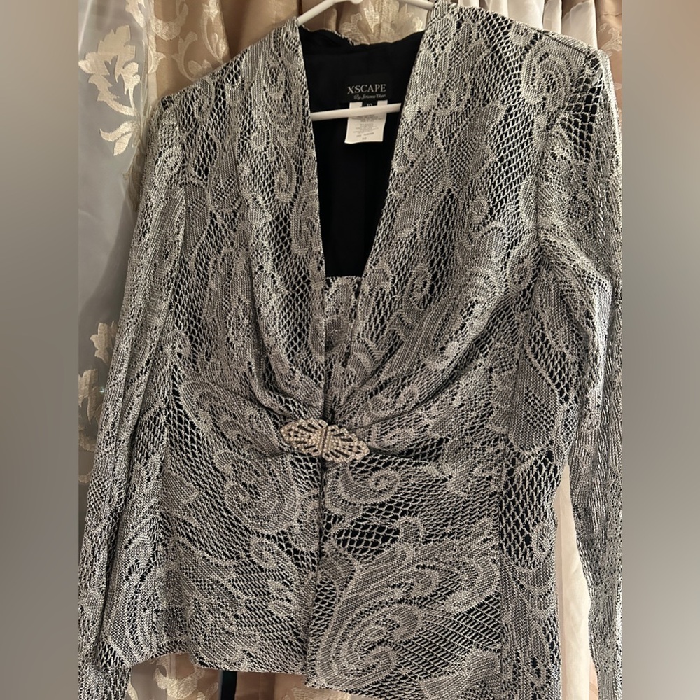 Escape silver, black, sparkle jacket. Medium